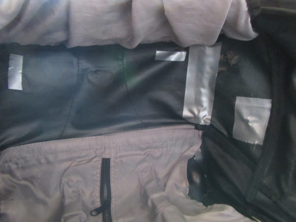 Duct Taping Inside of Backpack to Secure Hole