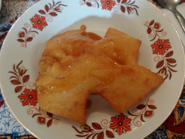 Fried dough with a sweet, pepper sauce? Sign me up!