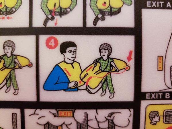My inflight entertainment was laughing at this safety card.